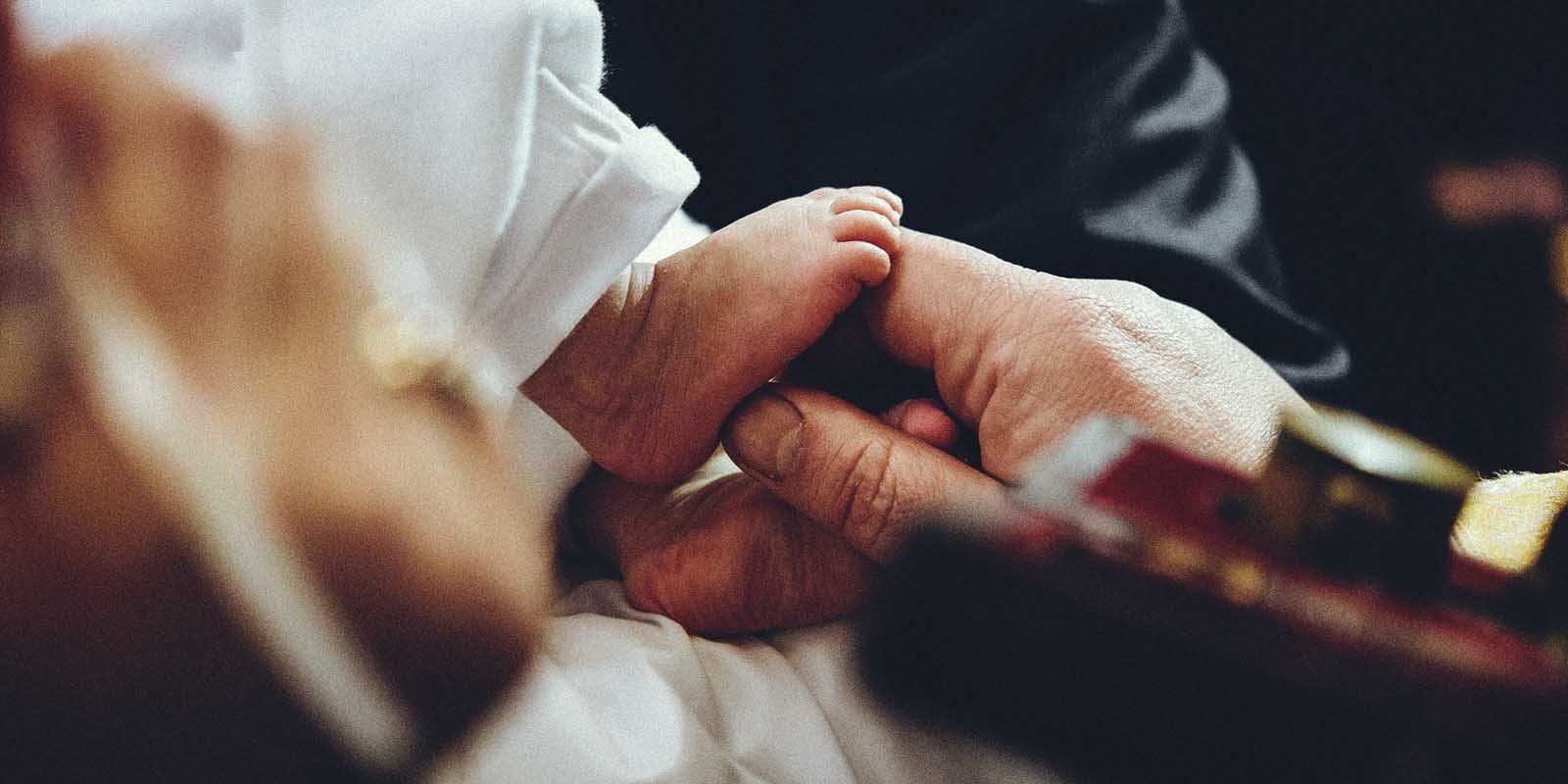 baby foot at christening
